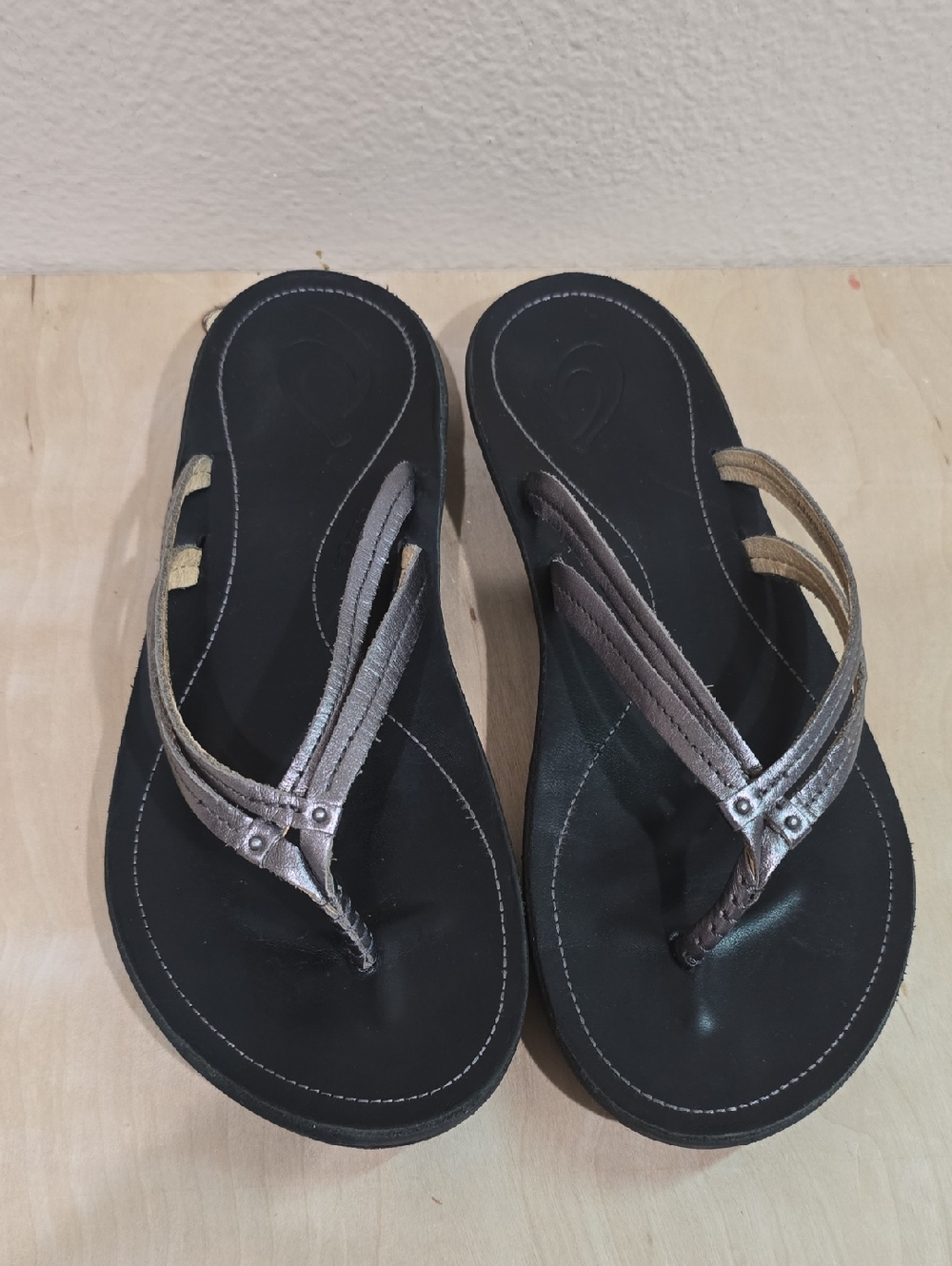 OluKai Women's Black Sandals with Metallic Bronze Straps